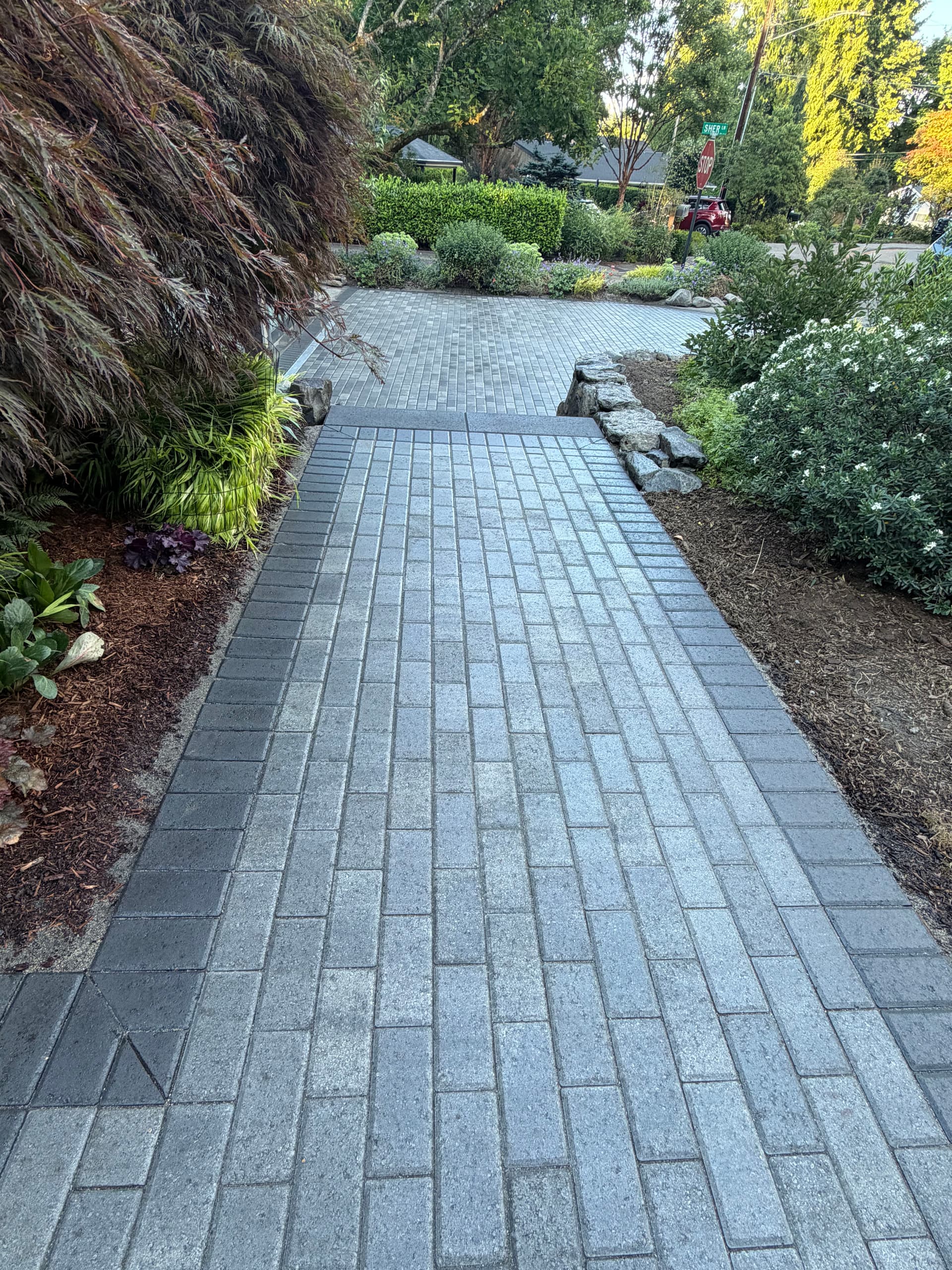 Custom Paver Driveway Walkway and Steps With a Modern Finish image