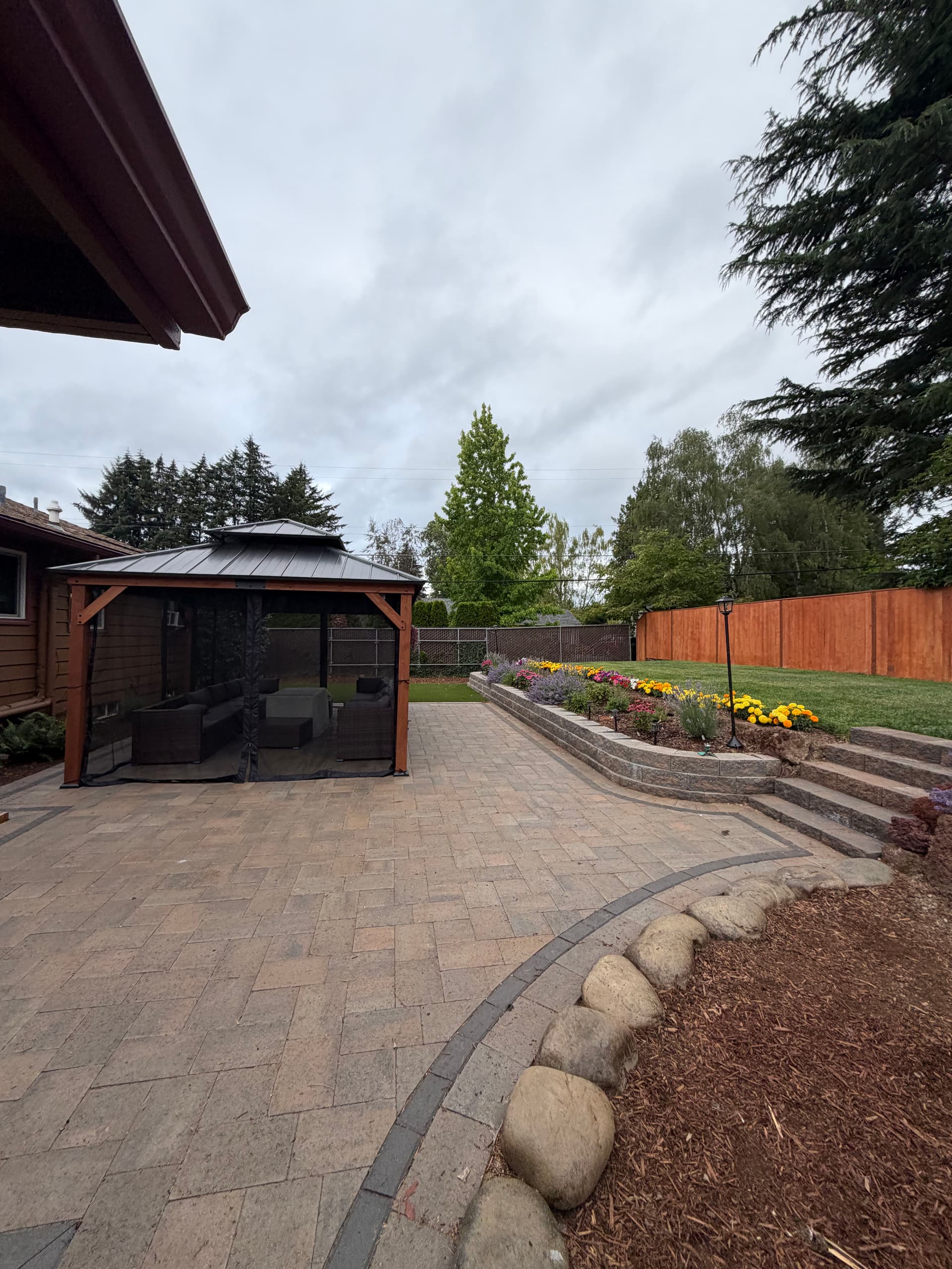 Full Backyard Overhaul with Pavers, Gazebo, and Retaining Walls image